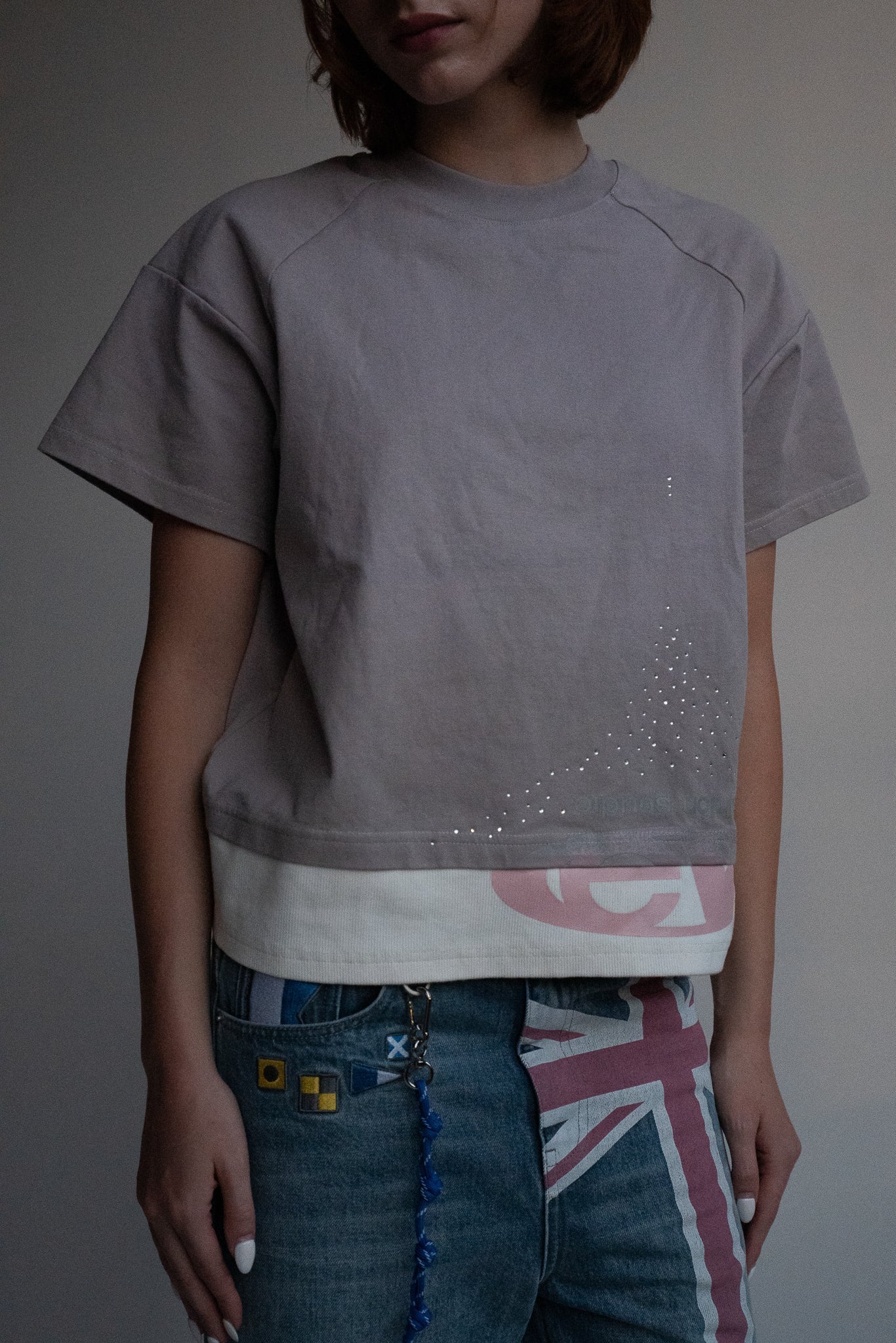 ash strata cotton tee with rhinestones and rose pedal emblem