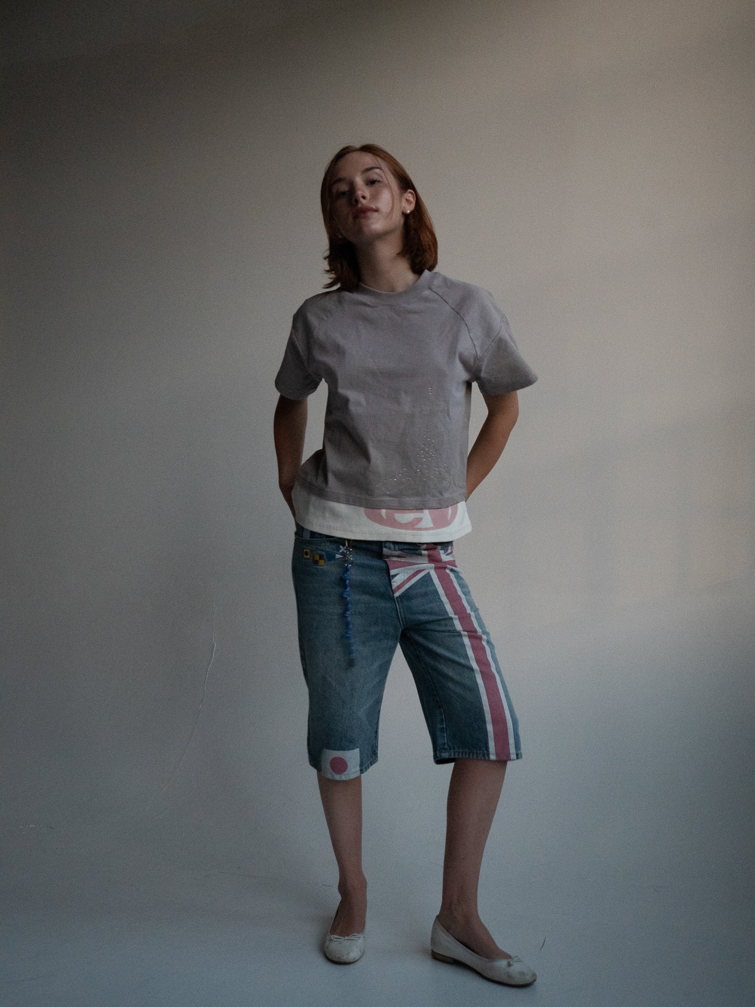 ash strata cotton tee with rhinestones and rose pedal emblem