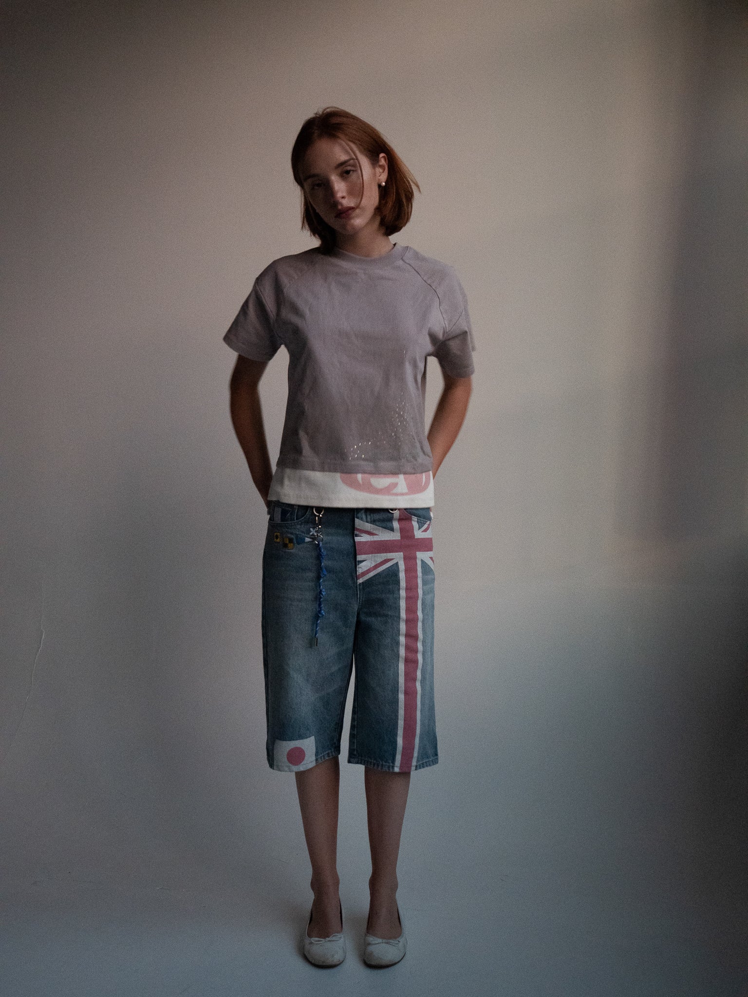 ash strata cotton tee with rhinestones and rose pedal emblem