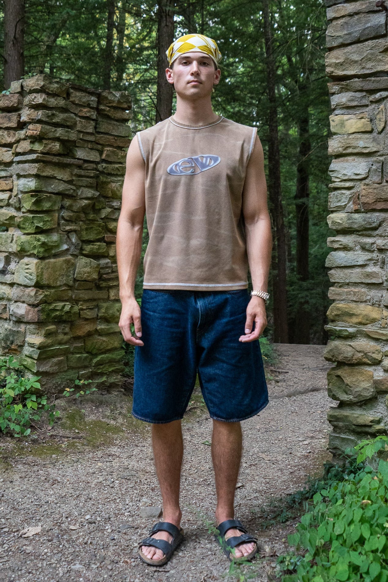 mud finished cutoff tank top with alloy emblem