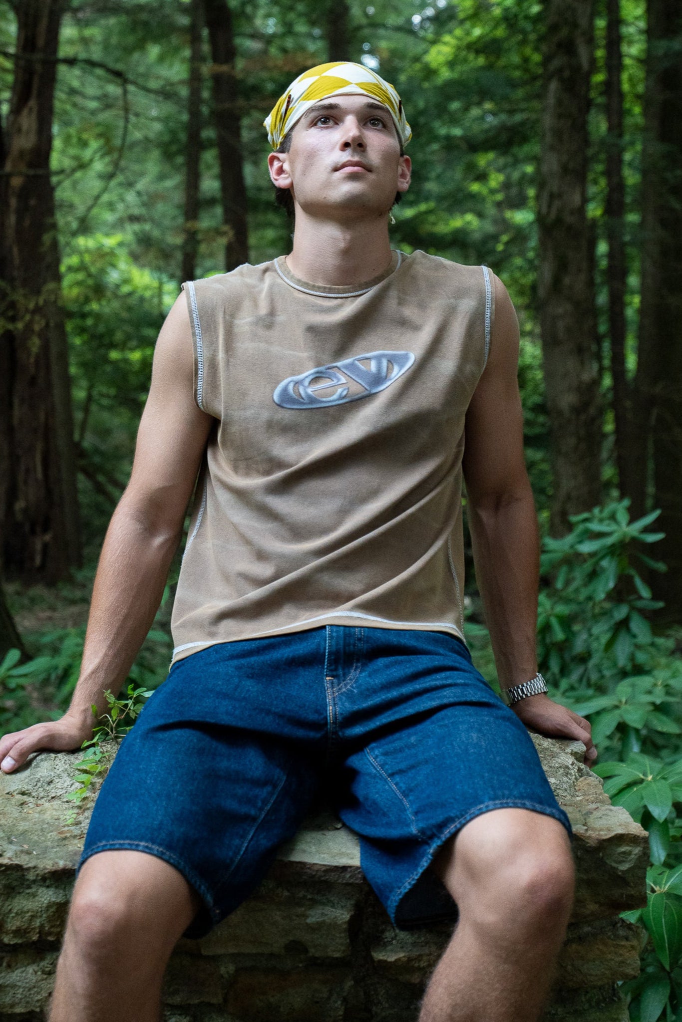 mud finished cutoff tank top with alloy emblem