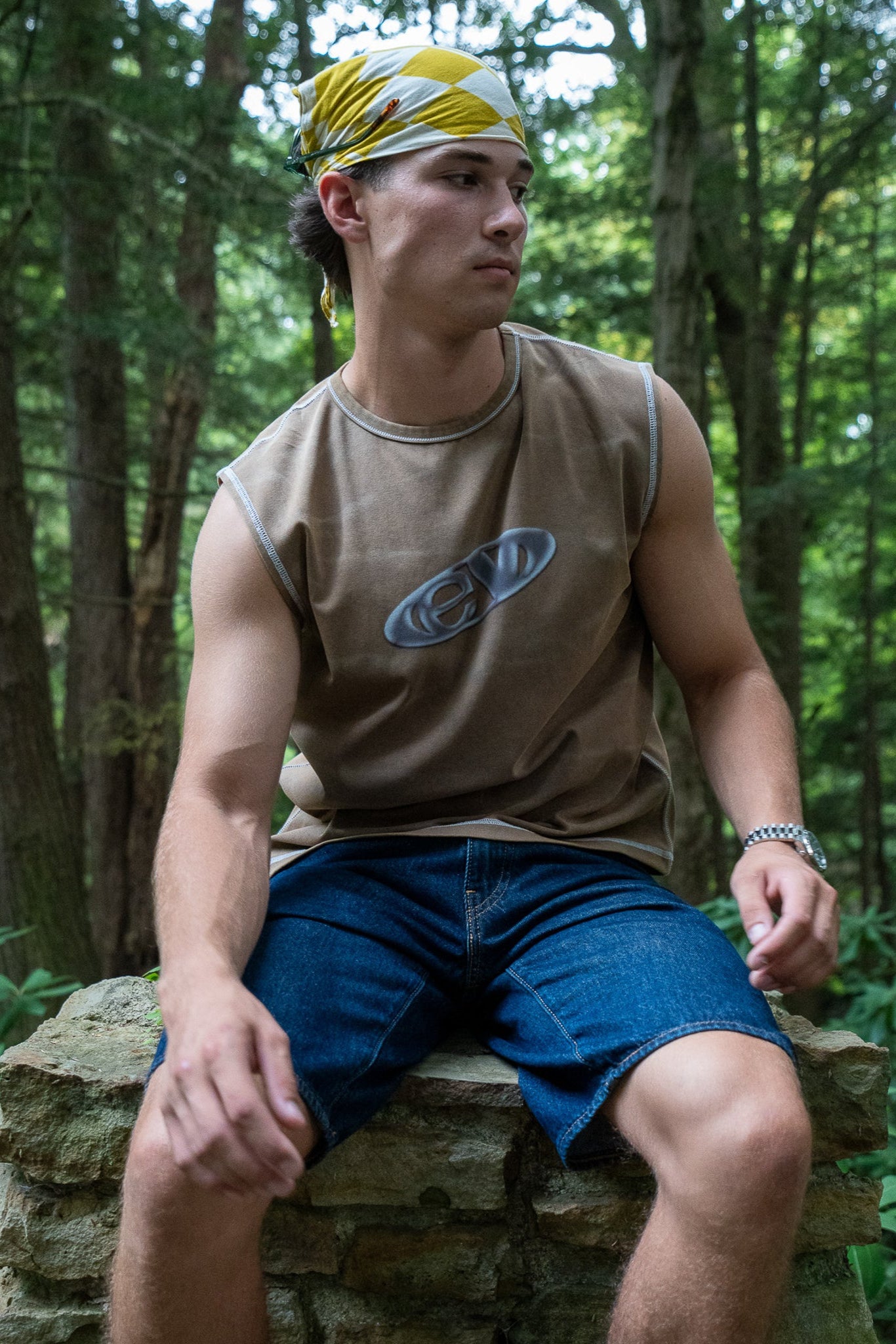 mud finished cutoff tank top with alloy emblem