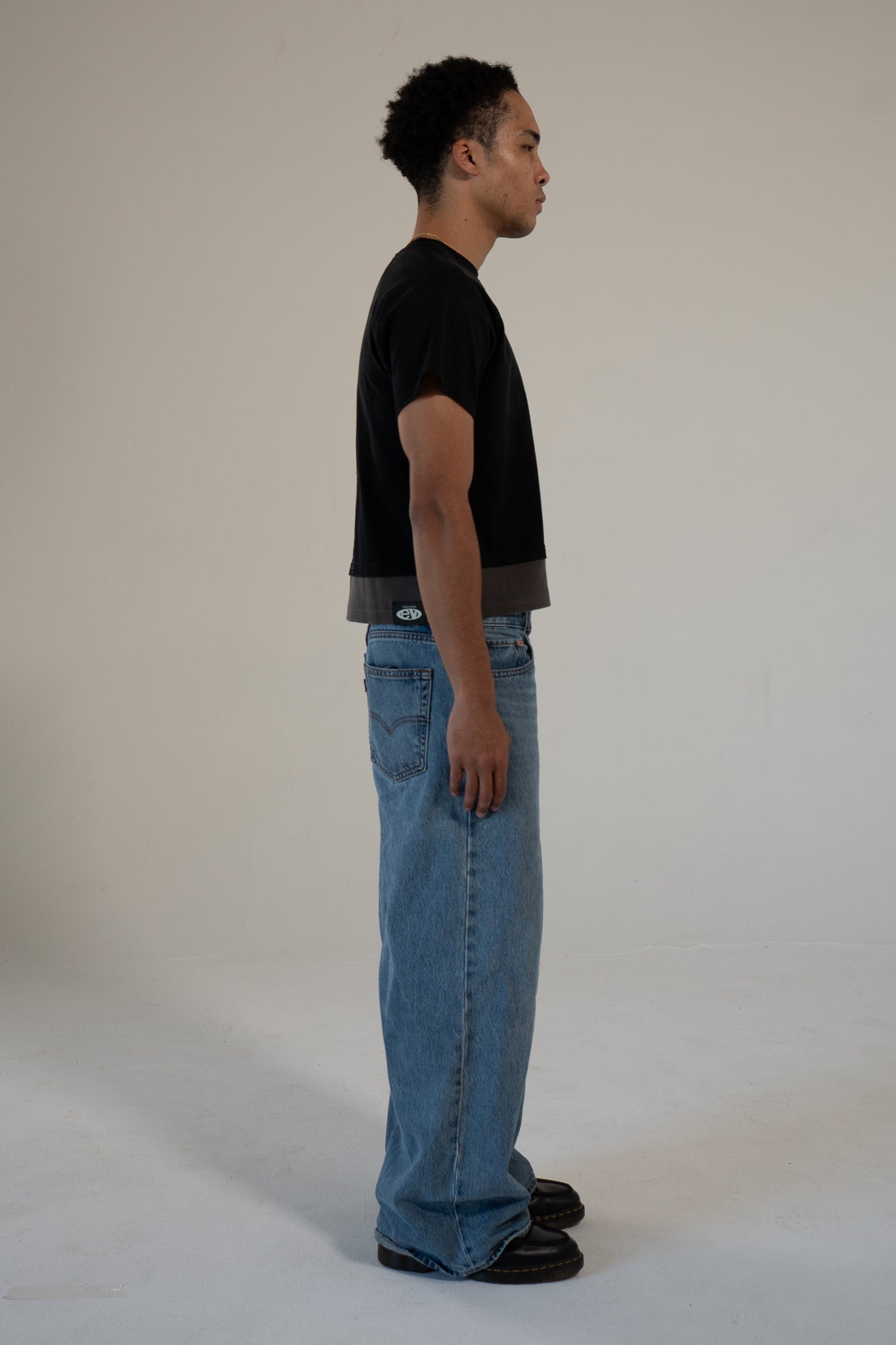 carbon strata cotton tee with rhinestones and leaf emblem