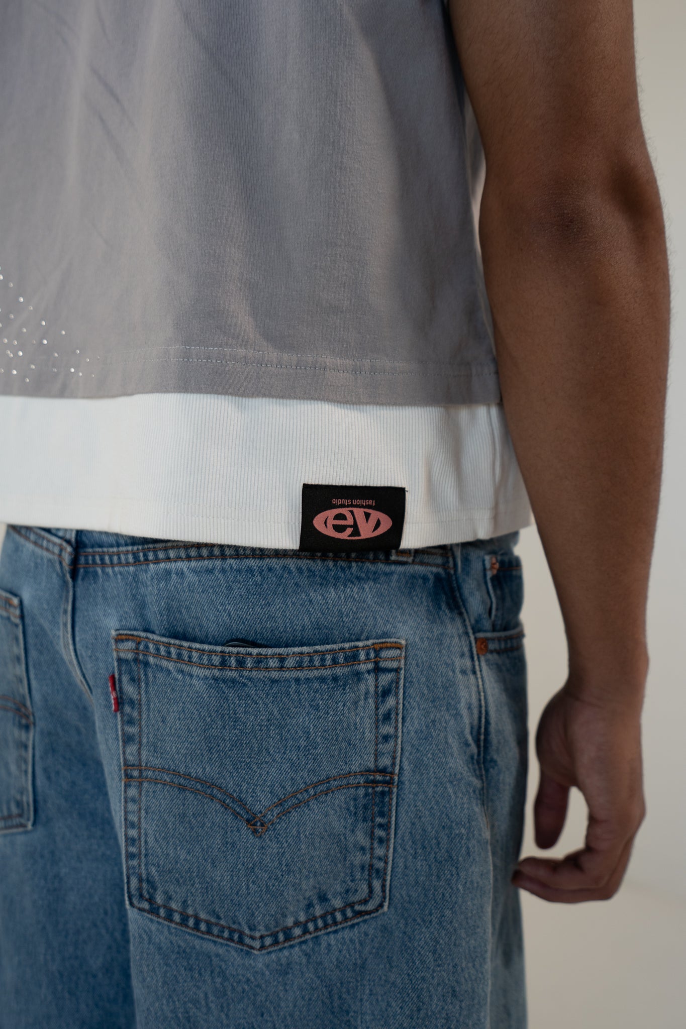 ash strata cotton tee with rhinestones and rose pedal emblem